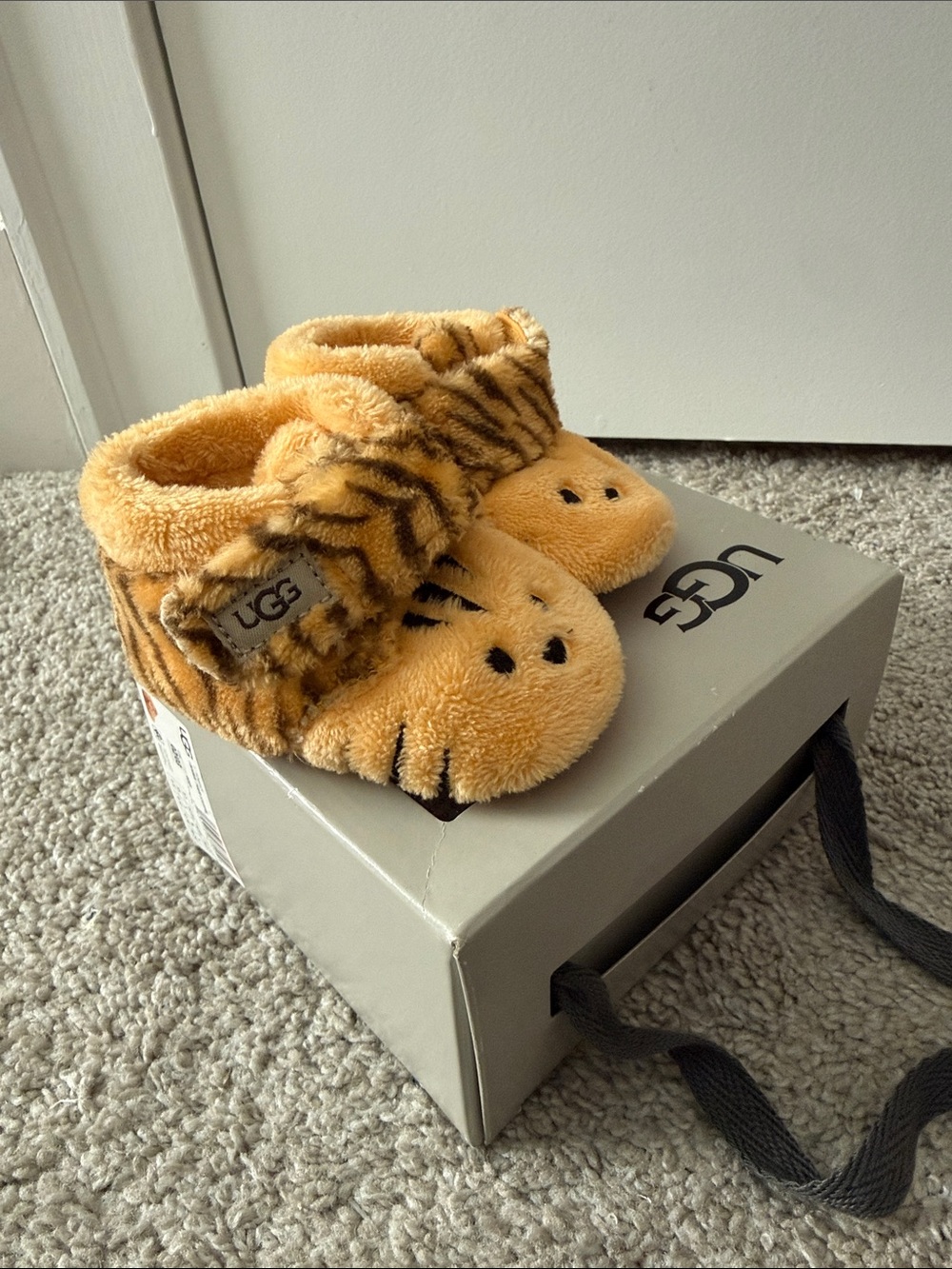 UGG Kids Tiger Plush Slip-Ons in Golden Orange